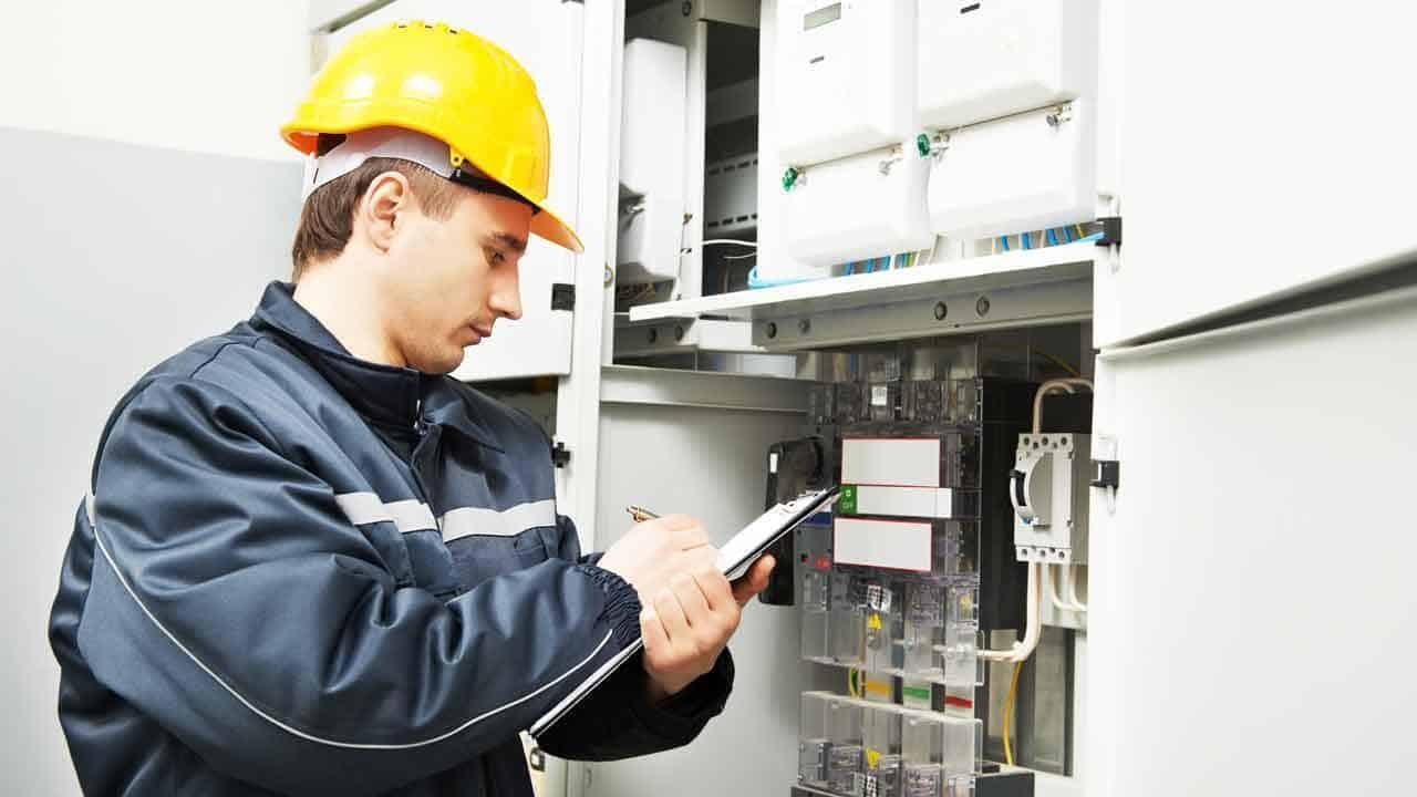An inspector uses the Electrical Inspection Checklist (Easy Downloadable Template) by 1stReporting.com
