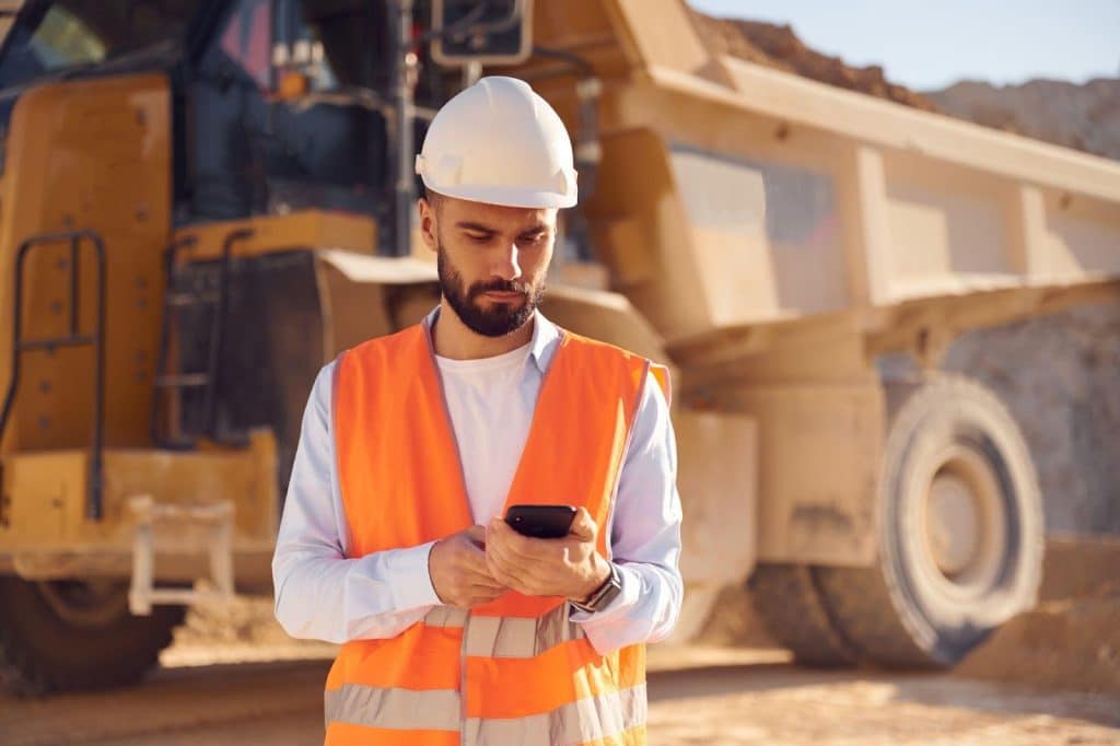 A construction safety inspector uses the 1st Reporting app to complete their Excavation Safety Inspection Checklist.